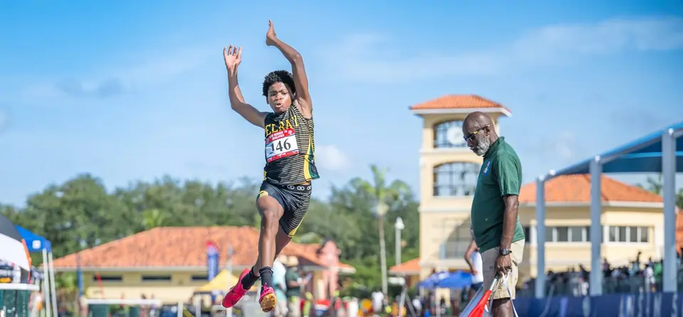 Triple jumper leaping off the board